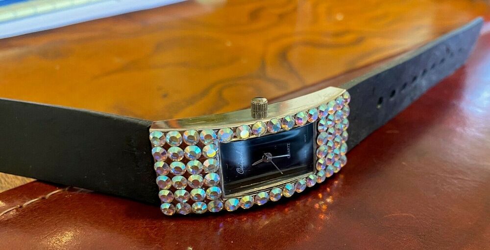Women's Osirock Watch, Silver Tone Case with Crystal Accents, Black Face, Poly B
